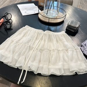 Short white skirt